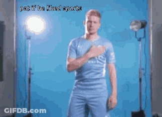 A Man In A Blue Shirt Stands In Front Of A Blue Background With The Words " Put If He Liked Sports " On The Bottom GIF