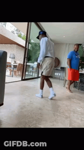A Man In A Blue Shirt That Says ' Atlanta ' On It GIF