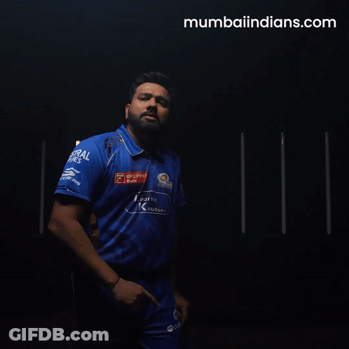 A Man In A Blue Shirt That Says Mumbaiindians.com On The Bottom GIF