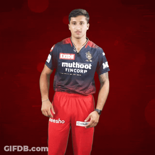 A Man In A Blue Shirt That Says Muthoot Fincorp GIF