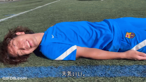 A Man In A Blue Shirt With A Fcb Logo On It GIF