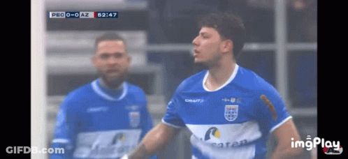 A Man In A Blue Shirt With Craft On It GIF