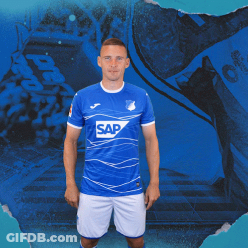 A Man In A Blue Shirt With Sap On It GIF