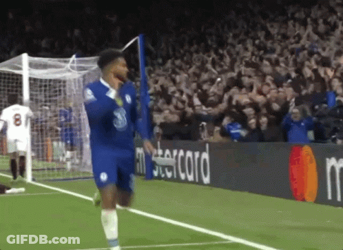 A Man In A Blue Shirt With The Number 8 On It GIF