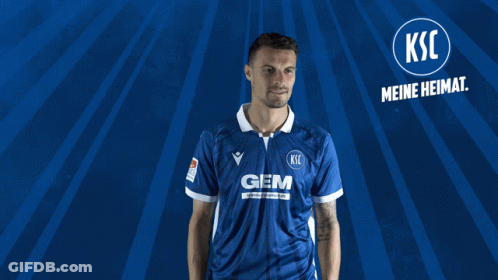 A Man In A Blue Shirt With The Word Gem On The Front GIF