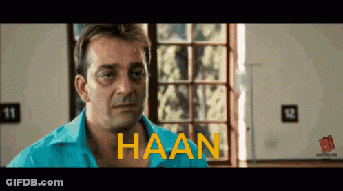 A Man In A Blue Shirt With The Word Haan Written On His Chest GIF