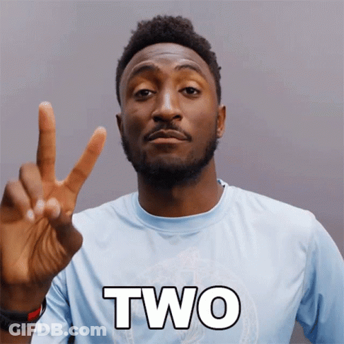 A Man In A Blue Shirt With The Word Two On The Front GIF