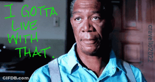 A Man In A Blue Shirt With The Words I Gotta Love With That Written In Green GIF