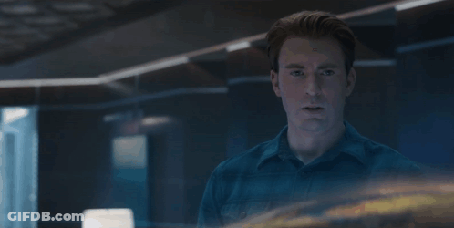 A Man In A Blue Shirt With The Words Let 'S Go Get This Son Of A Bitch Behind Him GIF