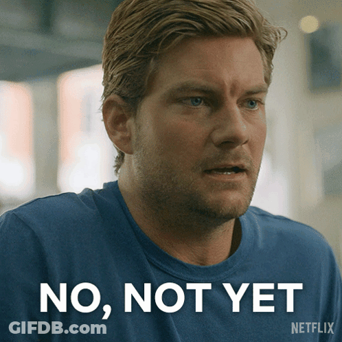 A Man In A Blue Shirt With The Words No Not Yet On The Bottom GIF