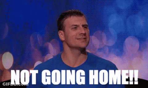 A Man In A Blue Shirt With The Words Not Going Home Written On It GIF