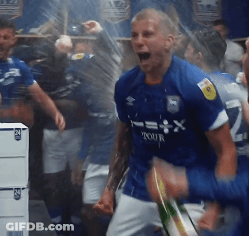 A Man In A Blue Shirt With Tour On It GIF