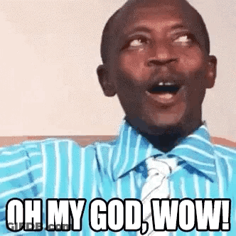 A Man In A Blue Striped Shirt And Tie Is Making A Funny Face And Saying Oh My God Wow . GIF