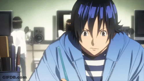 A Man In A Blue Striped Shirt Is Looking At Something GIF