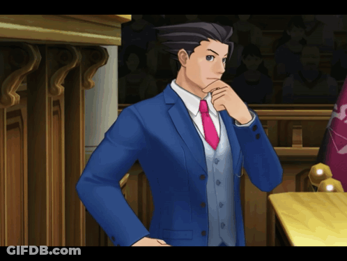A Man In A Blue Suit And Pink Tie Is Standing In A Courtroom GIF