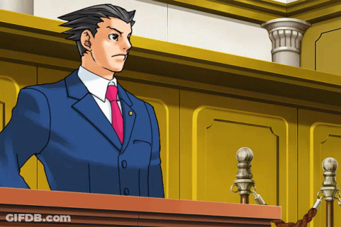 A Man In A Blue Suit And Red Tie Stands At A Podium GIF