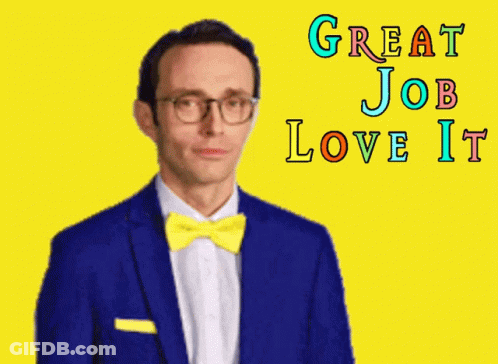 A Man In A Blue Suit And Yellow Bow Tie Giving The Middle Finger With The Words Great Job Love It Behind Him GIF