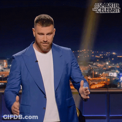 A Man In A Blue Suit Giving A Thumbs Up GIF