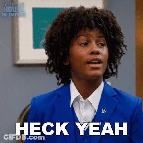 A Man In A Blue Suit Is Saying Heck Yeah GIF