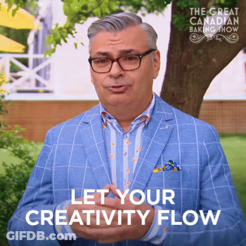 A Man In A Blue Suit Says Let Your Creativity Flow In Front Of A Tree GIF