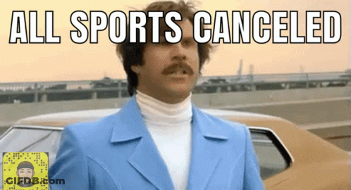 A Man In A Blue Suit Stands In Front Of A Car With The Words All Sports Canceled GIF