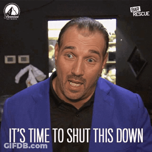 A Man In A Blue Suit With The Words It 'S Time To Shut This Down Below Him GIF