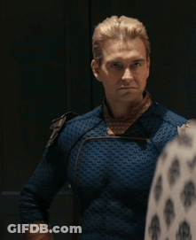 A Man In A Blue Superhero Costume Is Standing Next To Another Man GIF