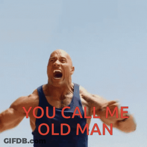 A Man In A Blue Tank Top Is Screaming With The Words You Call Me Old Man Above Him GIF