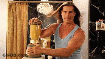 A Man In A Blue Tank Top Is Using A Blender In A Bathroom GIF