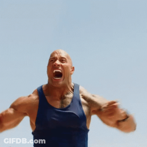 A Man In A Blue Tank Top With His Mouth Open GIF
