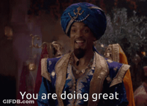 A Man In A Blue Turban Is Smiling And Says You Are Doing Great GIF