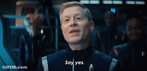 A Man In A Blue Uniform Says Yes GIF