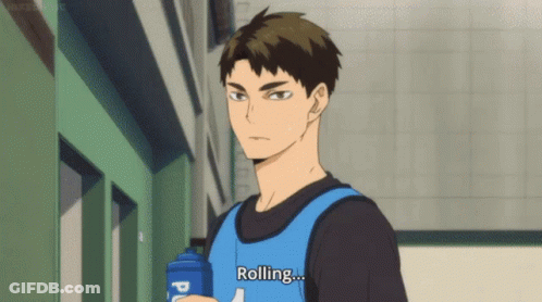 A Man In A Blue Vest Is Holding A Water Bottle And Says `` Rolling '' . GIF