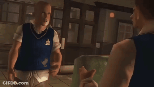 A Man In A Blue Vest With A Crest On It Stands Next To Another Man GIF