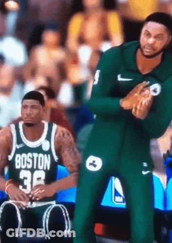 A Man In A Boston Jersey Sits On The Bench During A Basketball Game GIF