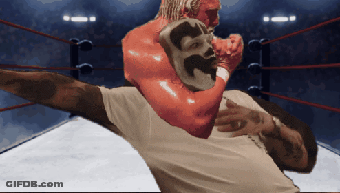 A Man In A Boxing Ring Has A Red Glove With The Number 32 On It GIF