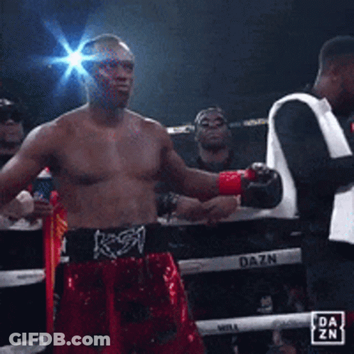 A Man In A Boxing Ring With A Dazn Logo GIF
