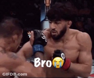 A Man In A Boxing Ring With The Word Bro Written On The Screen GIF