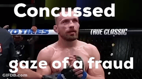 A Man In A Boxing Ring With The Words " Concused Gaze Of A Fraud " Below Him GIF