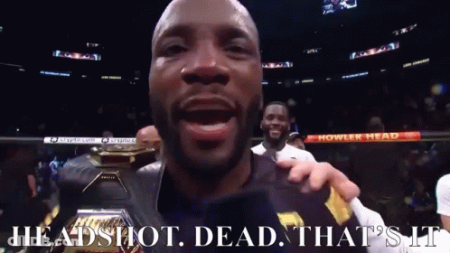 A Man In A Boxing Ring With The Words Headshot Dead That 'S It On The Bottom GIF