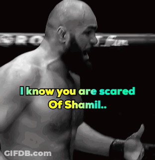 A Man In A Boxing Ring With The Words " I Know You Are Scared Of Shamil " Above Him GIF