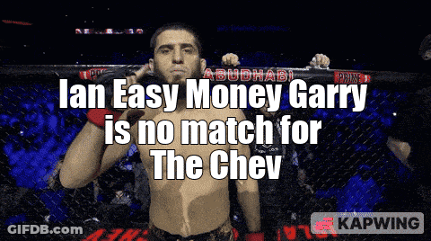 A Man In A Boxing Ring With The Words " Ian Easy Money Garry Is No Match For The Chev " GIF