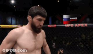 A Man In A Boxing Ring With Ufc Apex In The Background GIF