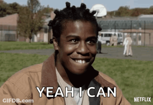 A Man In A Brown Jacket Is Smiling And Says Yeah I Can . GIF