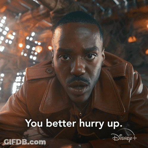 A Man In A Brown Jacket Says You Better Hurry Up On A Disney + Ad GIF