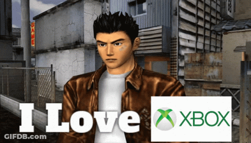 A Man In A Brown Jacket Stands In Front Of A Sign That Says " I Love Xbox " GIF