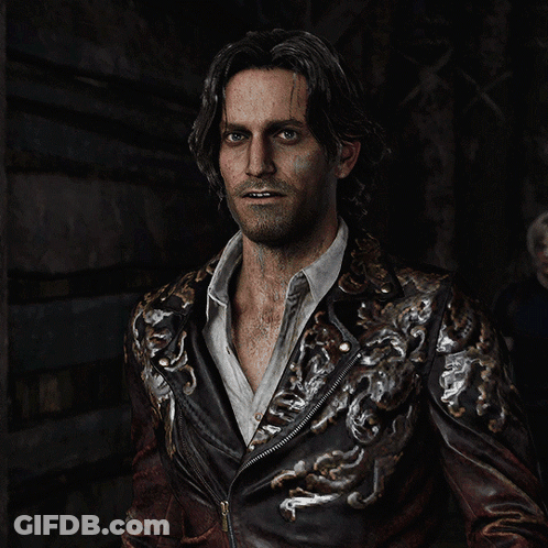 A Man In A Brown Leather Jacket Is Waving GIF
