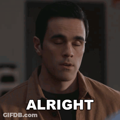 Man In Brown Shirt Saying Alright GIF