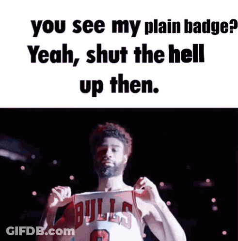 A Man In A Bulls Jersey Has His Fist Up In The Air GIF