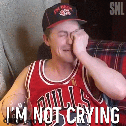 A Man In A Bulls Jersey Is Crying GIF